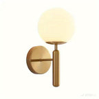 Contemporary Wall Light Fixture with Glass Globe and Polished Metal
