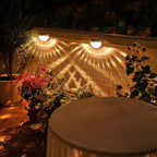 Round Black Solar Wall Light for Outdoor Use with Decorative Pattern