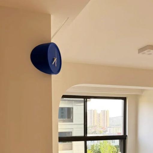 Chic Orange Corner Wall Clock for Modern Homes