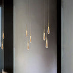 Minimalist Hanging Light Fixture with Modern Gold Teardrop Pendant