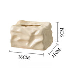 Elegant Ceramic Tissue Holder with Artistic Flair