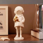 Cosmic Explorer Figurine with Golden Sea Creature