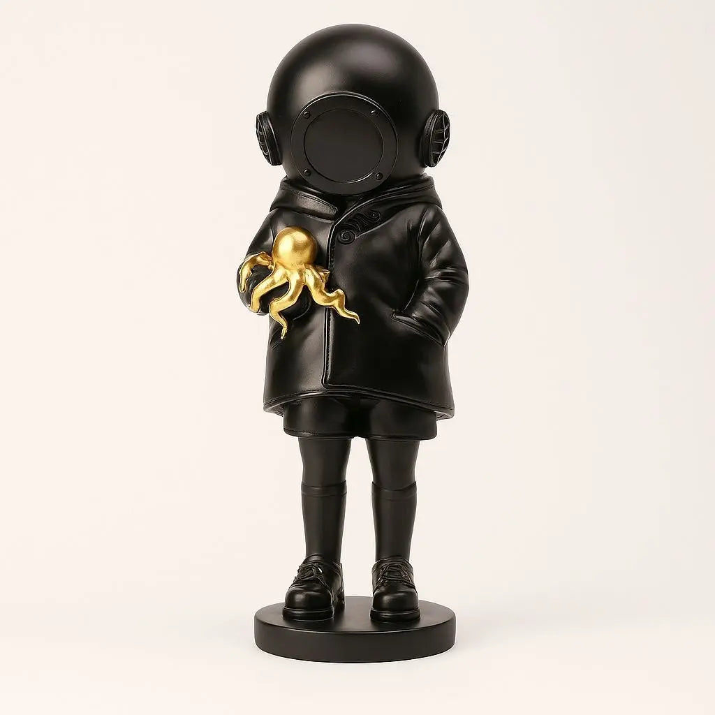 Cosmic Explorer Figurine with Golden Sea Creature
