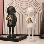 Cosmic Explorer Figurine with Golden Sea Creature