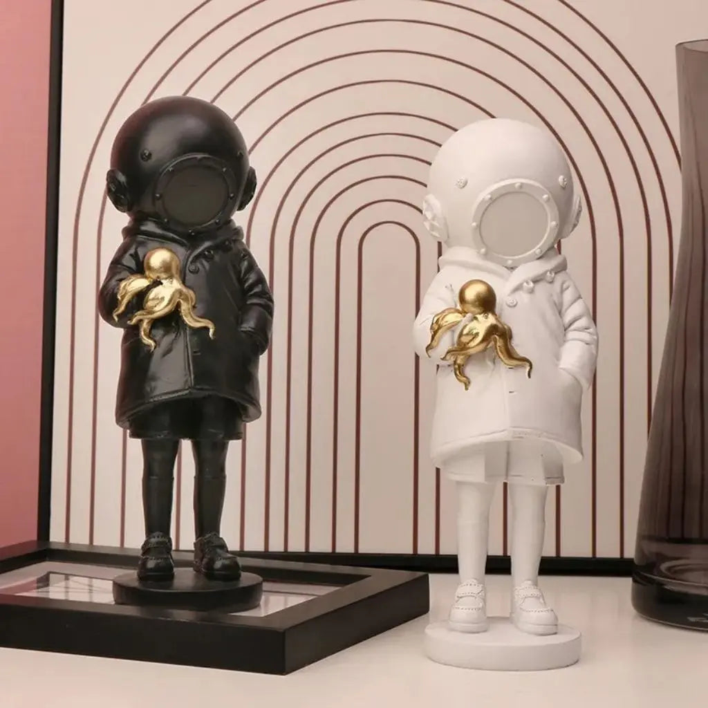 Cosmic Explorer Figurine with Golden Sea Creature