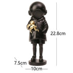 Cosmic Explorer Figurine with Golden Sea Creature
