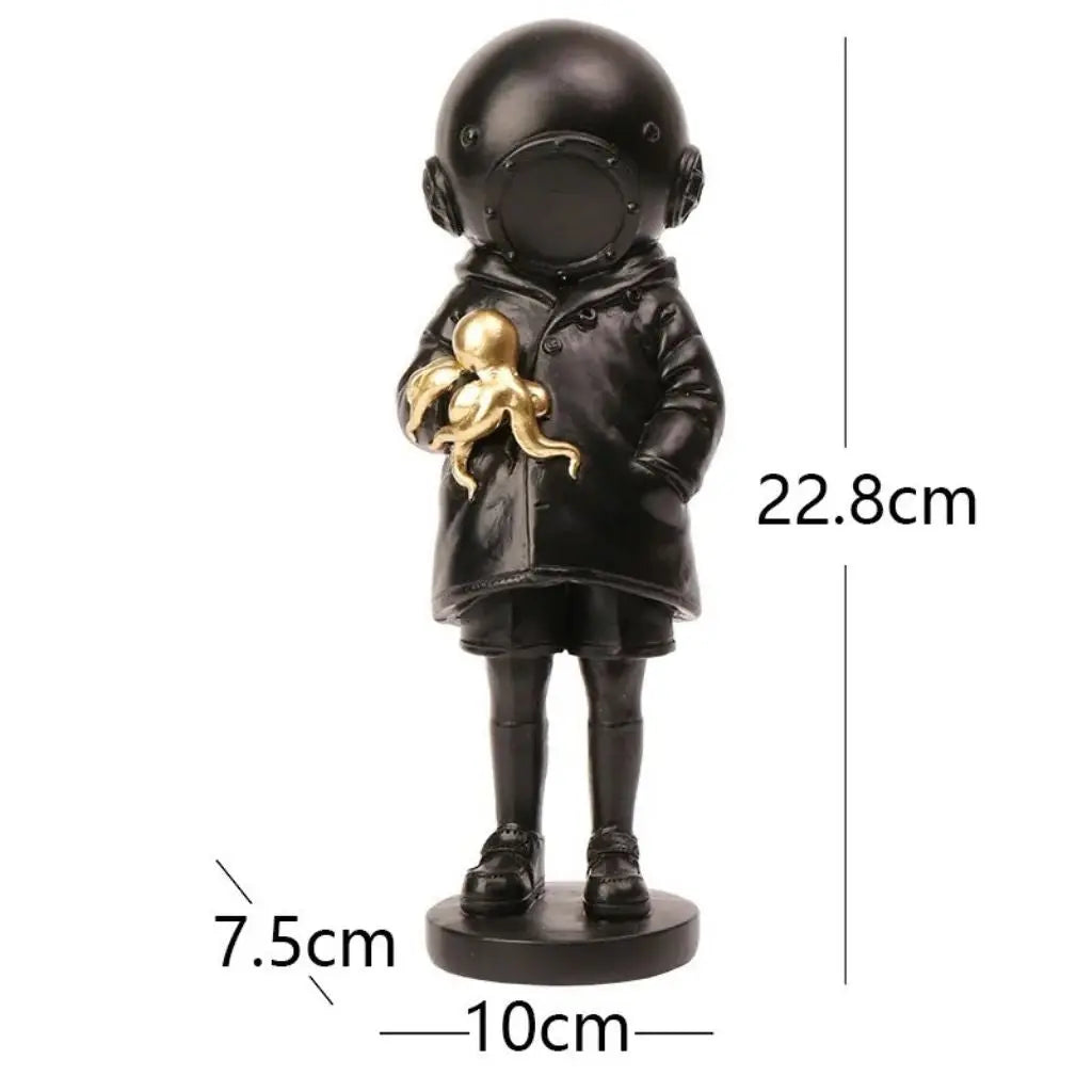 Cosmic Explorer Figurine with Golden Sea Creature