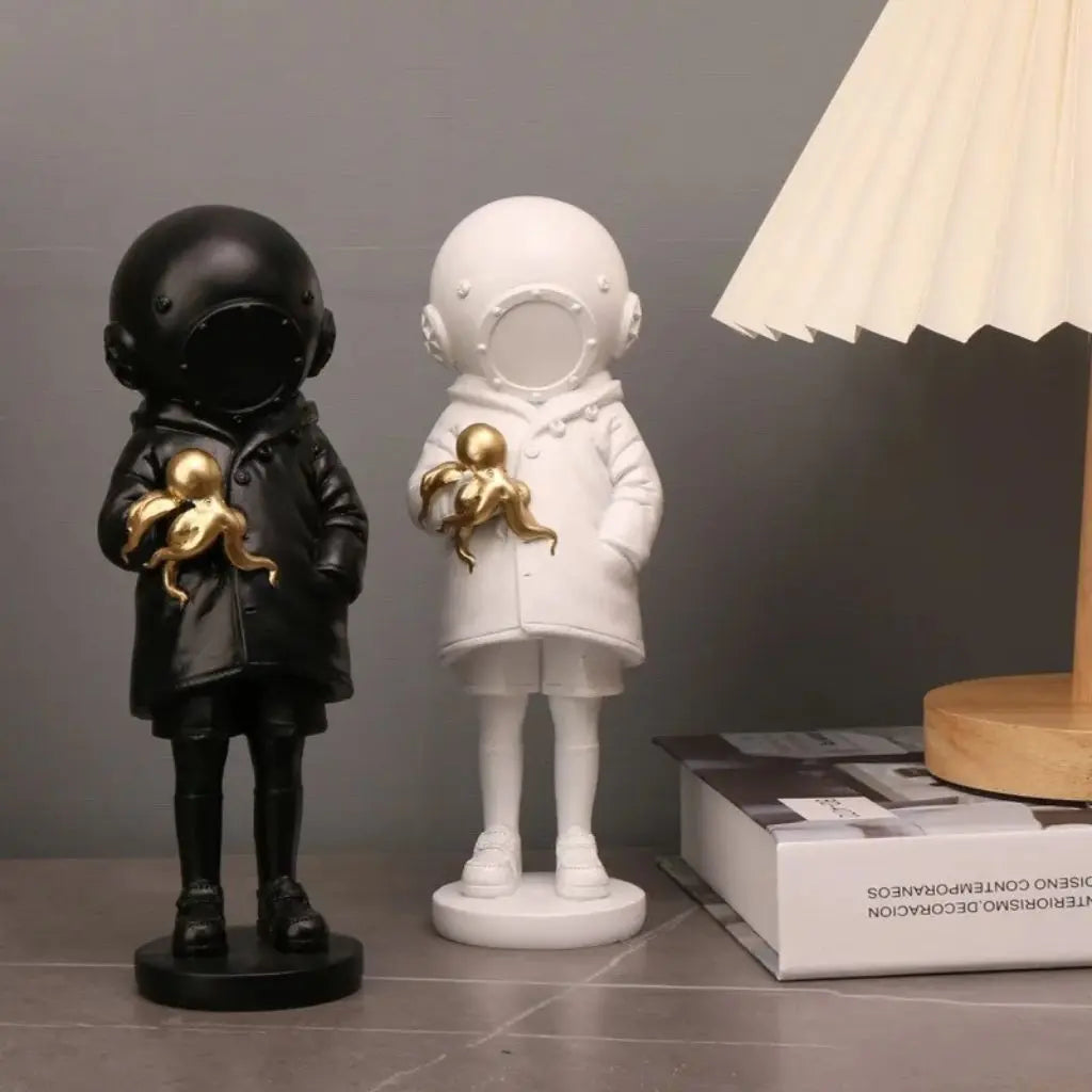 Cosmic Explorer Figurine with Golden Sea Creature