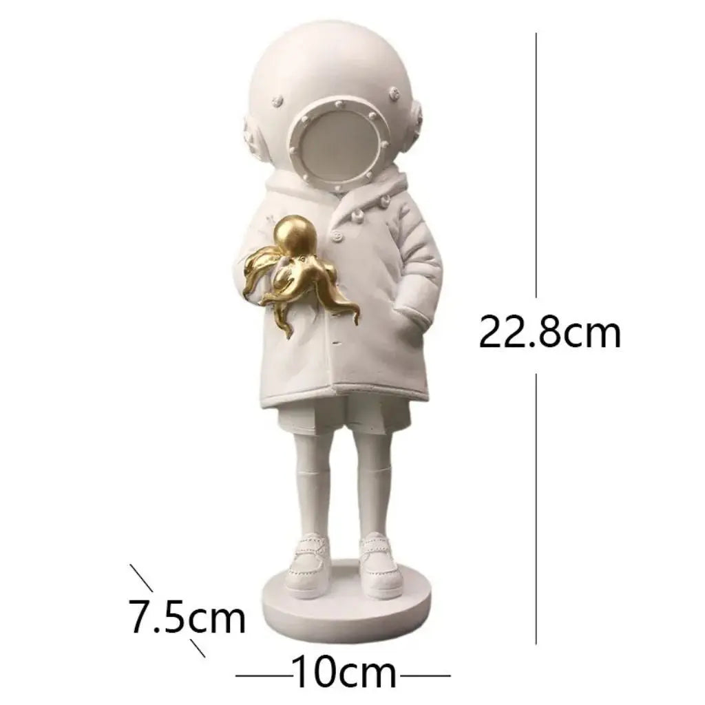 Cosmic Explorer Figurine with Golden Sea Creature