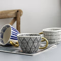 Chic Ceramic Coffee Mug with Gold Handle and Geometric Pattern