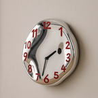 Sleek Ceramic Wall Timepiece with Chrome Accents