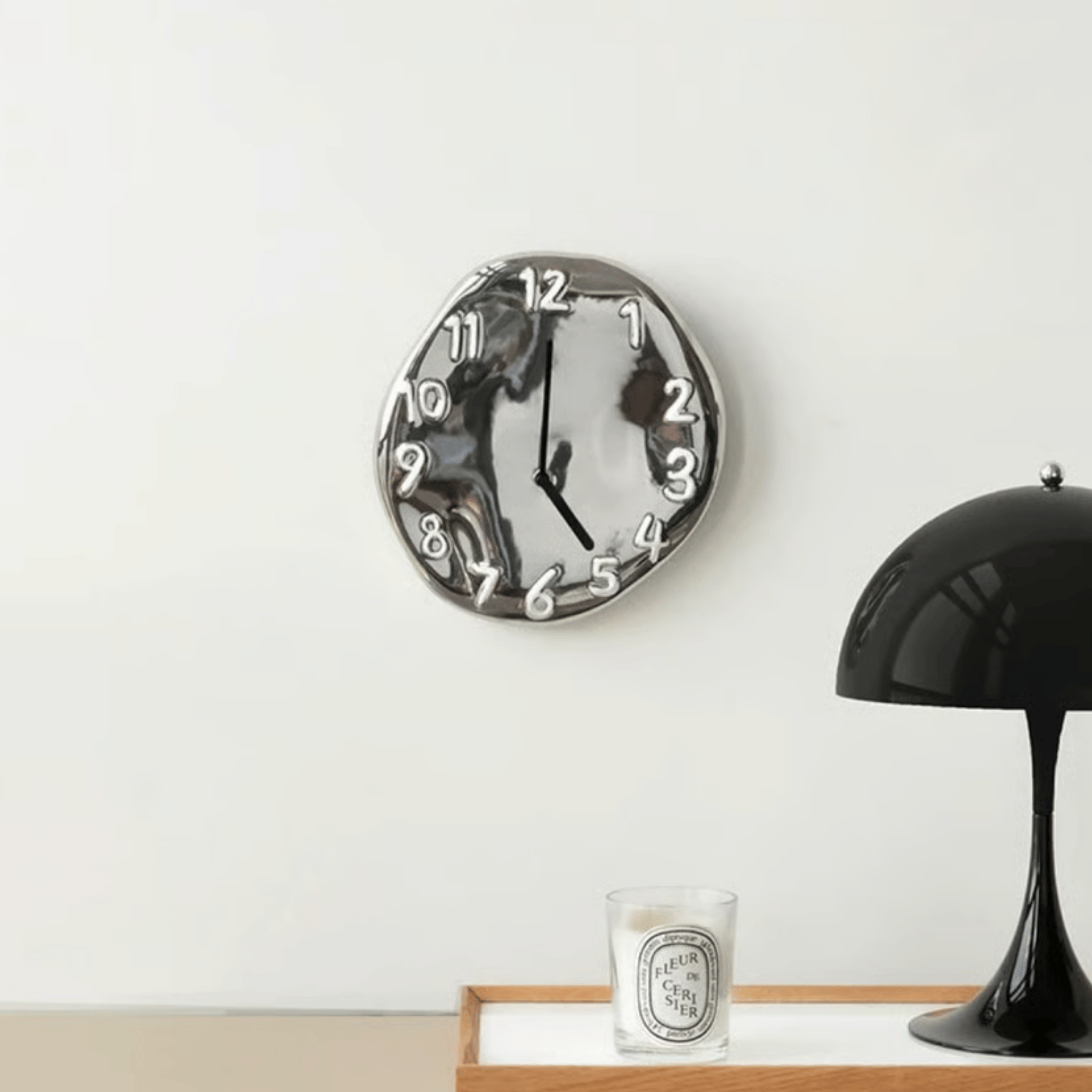 Sleek Ceramic Wall Timepiece with Chrome Accents