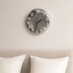Sleek Ceramic Wall Timepiece with Chrome Accents