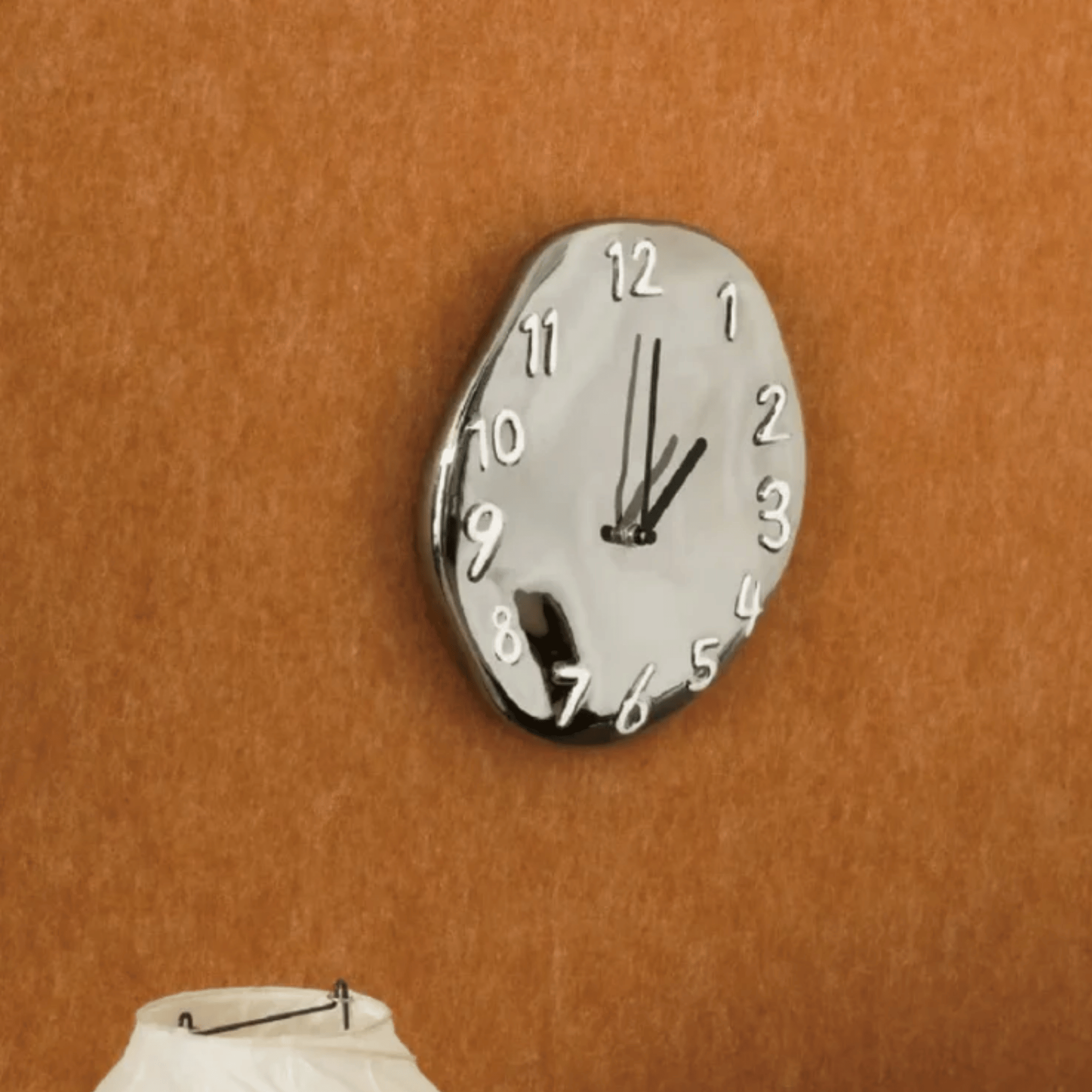 Sleek Ceramic Wall Timepiece with Chrome Accents