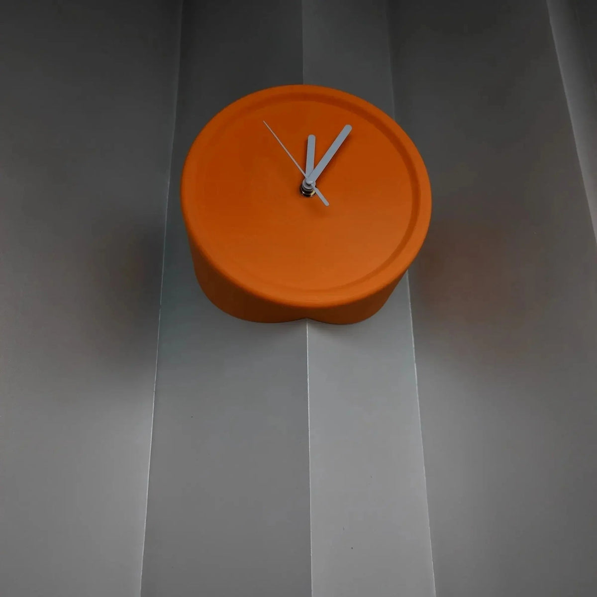 Chic Orange Corner Wall Clock for Modern Homes