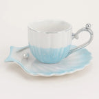 Elegant Seashell-Inspired Cup and Saucer Duo
