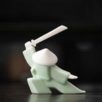 Elegant Martial Arts-Inspired Ceramic Incense Stand