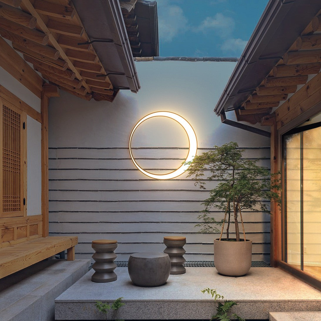 Round Outdoor Wall Light Featuring Ring Design
