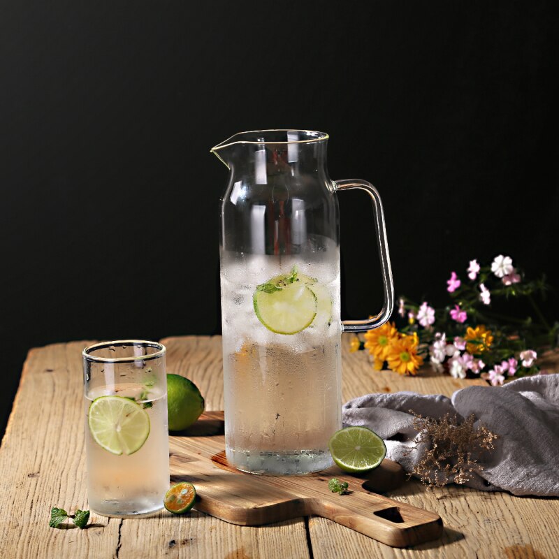 Sleek Glass Beverage Server with Stainless Steel Lid