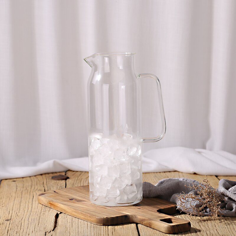 Sleek Glass Beverage Server with Stainless Steel Lid