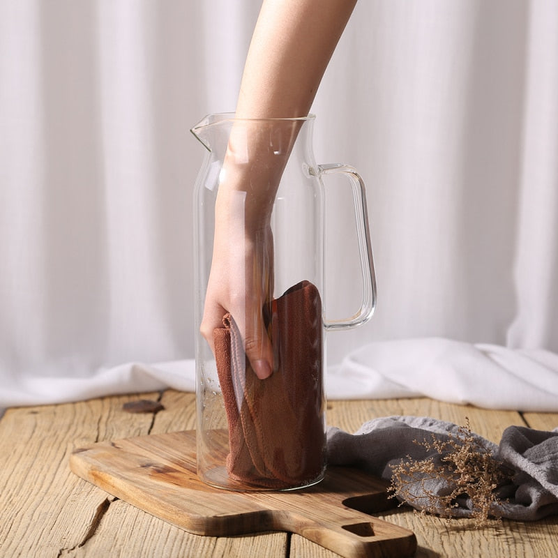 Sleek Glass Beverage Server with Stainless Steel Lid
