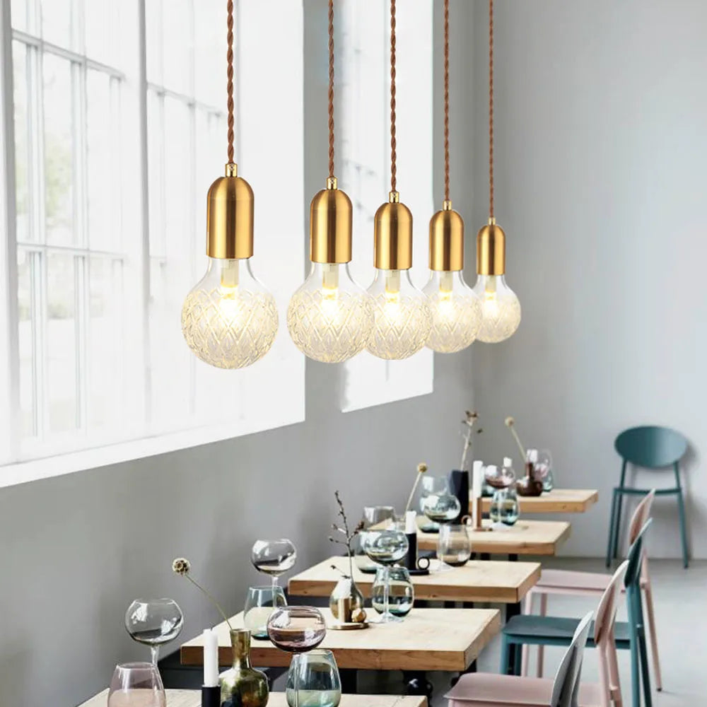 Radiant Elegance: Brass Pendant Light with Crystal Glass Shade