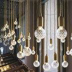 Radiant Elegance: Brass Pendant Light with Crystal Glass Shade