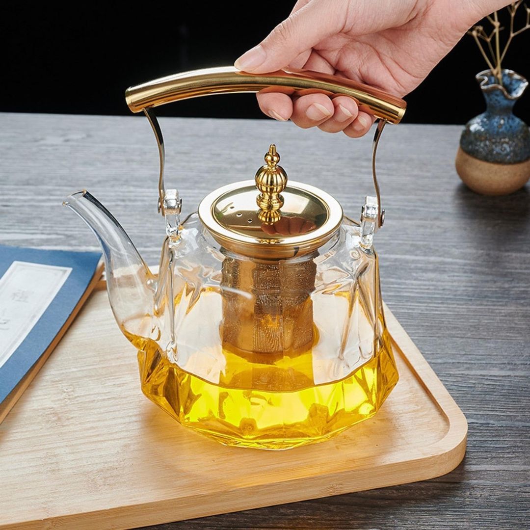 Elegant Glass Teapot with Stylish Copper Accents