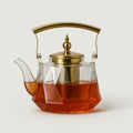 Elegant Glass Teapot with Stylish Copper Accents