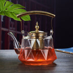 Elegant Glass Teapot with Stylish Copper Accents