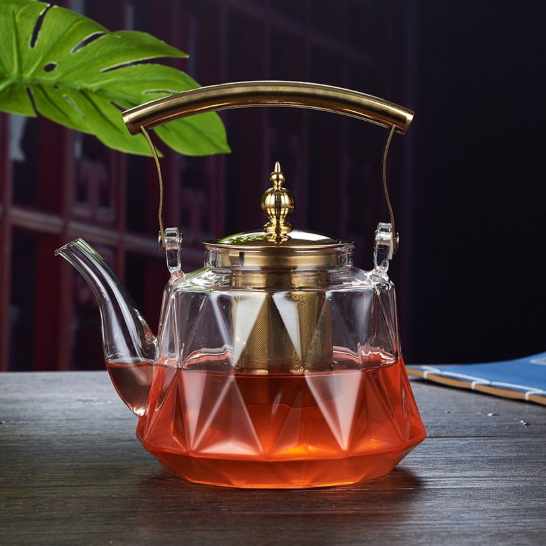 Elegant Glass Teapot with Stylish Copper Accents