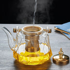 Elegant Glass Teapot with Stylish Copper Accents