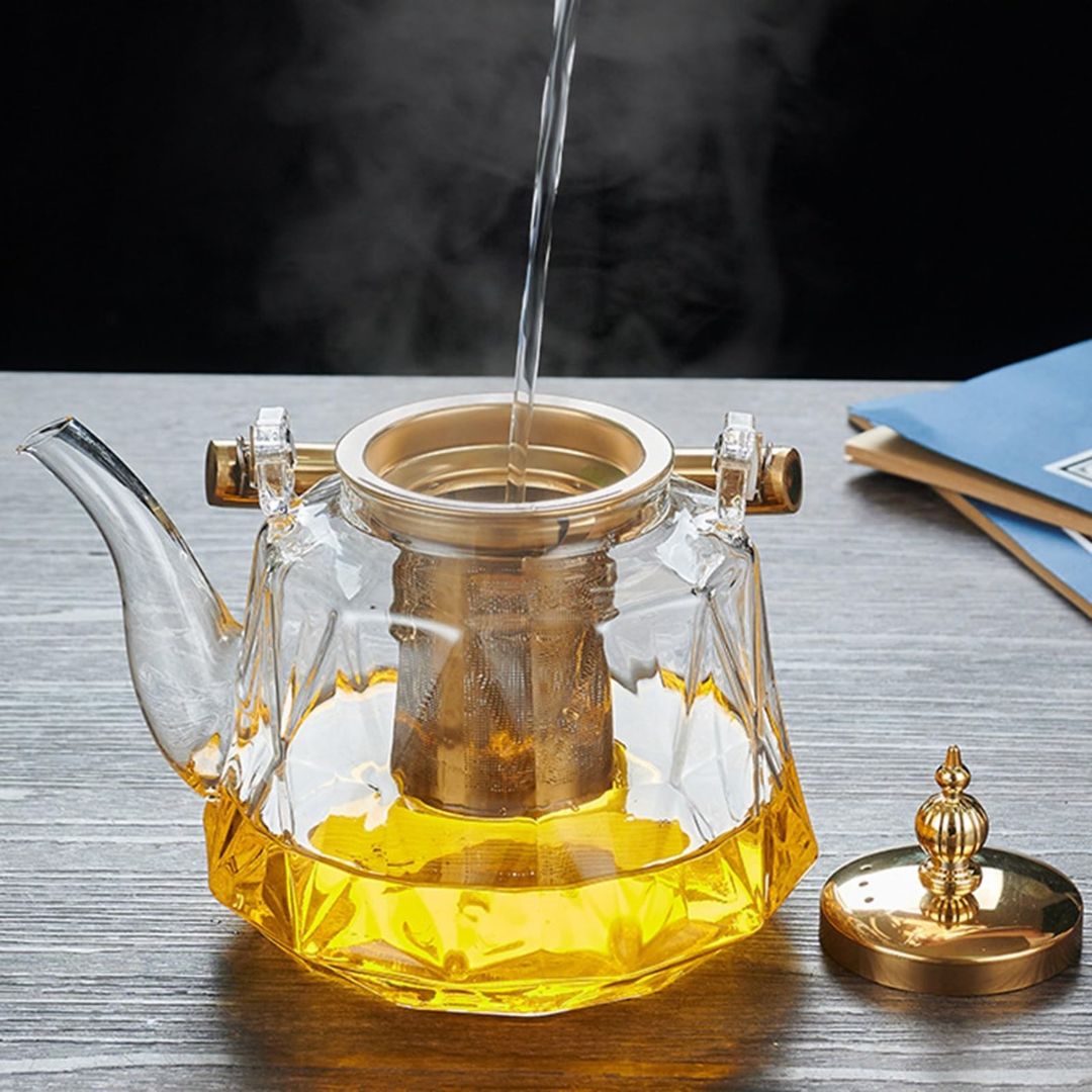 Elegant Glass Teapot with Stylish Copper Accents