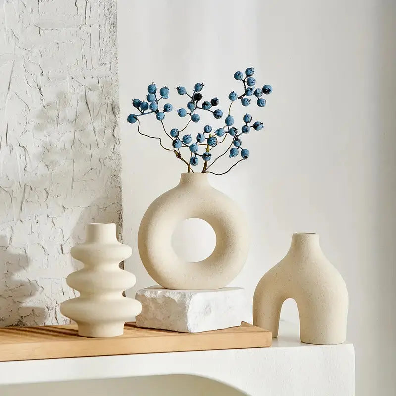 Serene Elegance: Trio of Artistic Vases