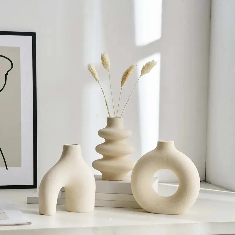 Serene Elegance: Trio of Artistic Vases