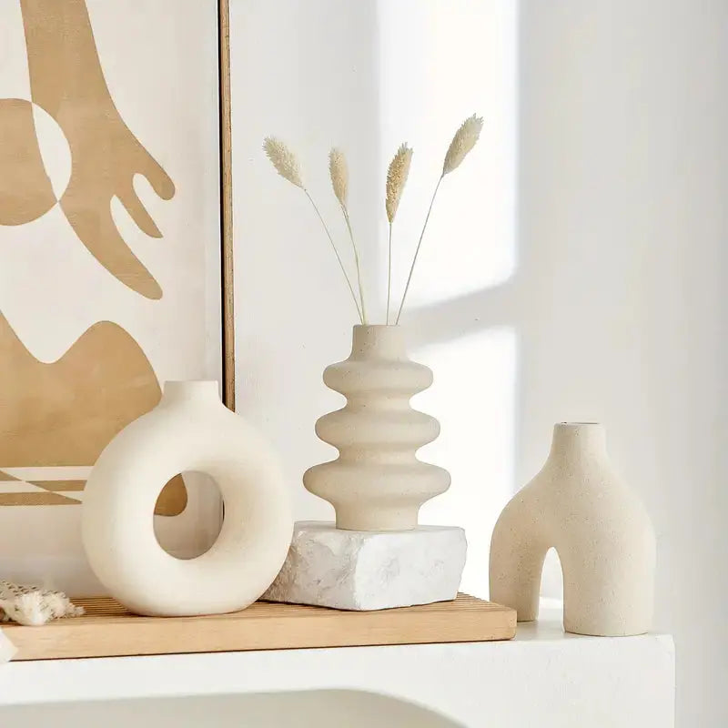 Serene Elegance: Trio of Artistic Vases