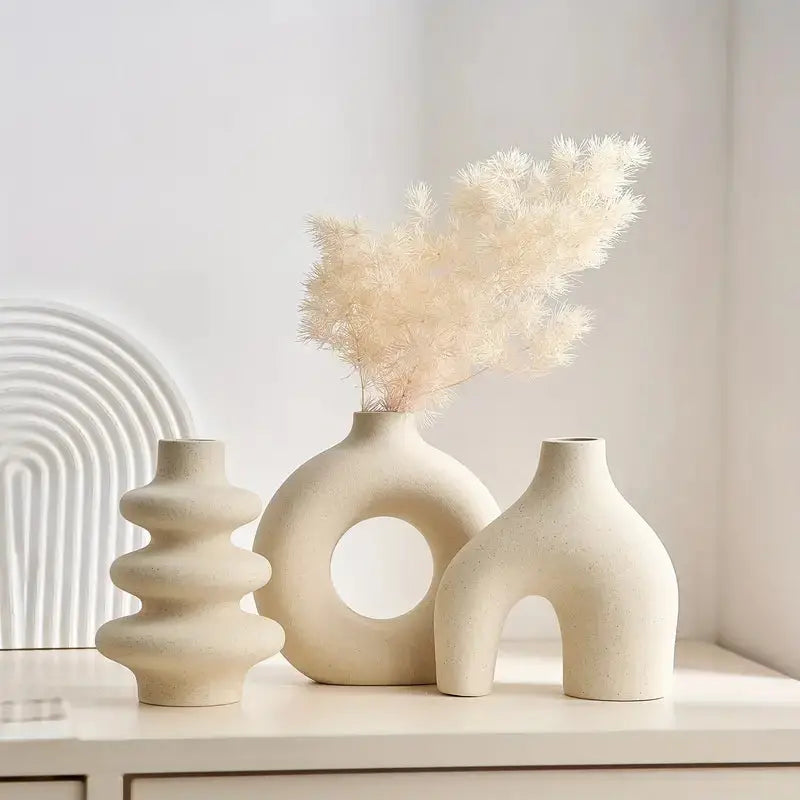 Serene Elegance: Trio of Artistic Vases