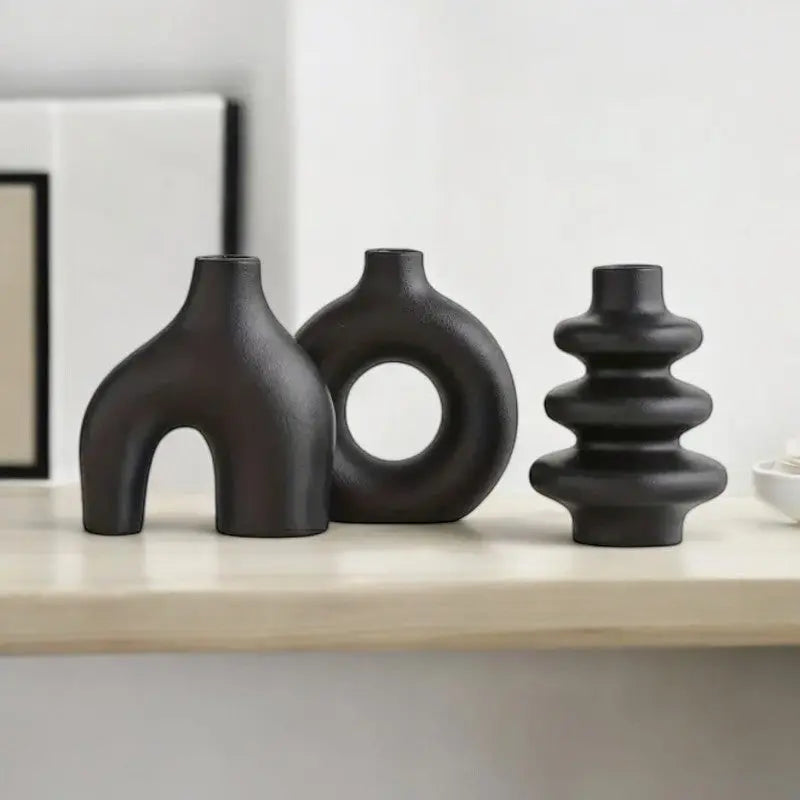 Serene Elegance: Trio of Artistic Vases