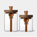 Sleek Glass Canisters with Wooden Lids for Kitchen Storage