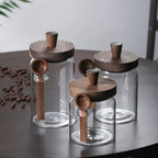 Sleek Glass Canisters with Wooden Lids for Kitchen Storage