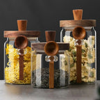 Sleek Glass Canisters with Wooden Lids for Kitchen Storage