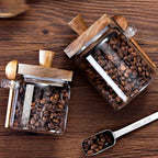 Sleek Glass Canisters with Wooden Lids for Kitchen Storage