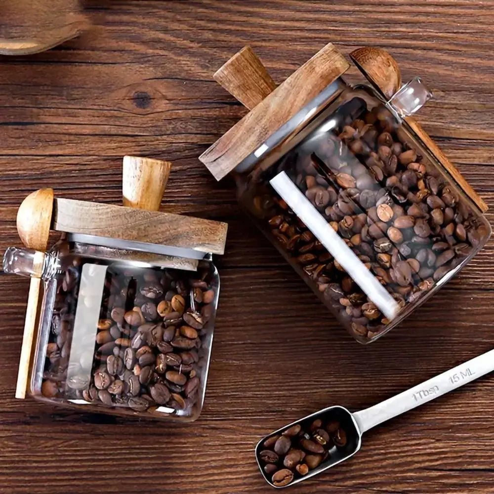 Sleek Glass Canisters with Wooden Lids for Kitchen Storage