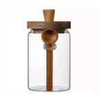 Sleek Glass Canisters with Wooden Lids for Kitchen Storage