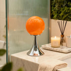 Elegant Glass Globe Lamp with Modern Metal Base