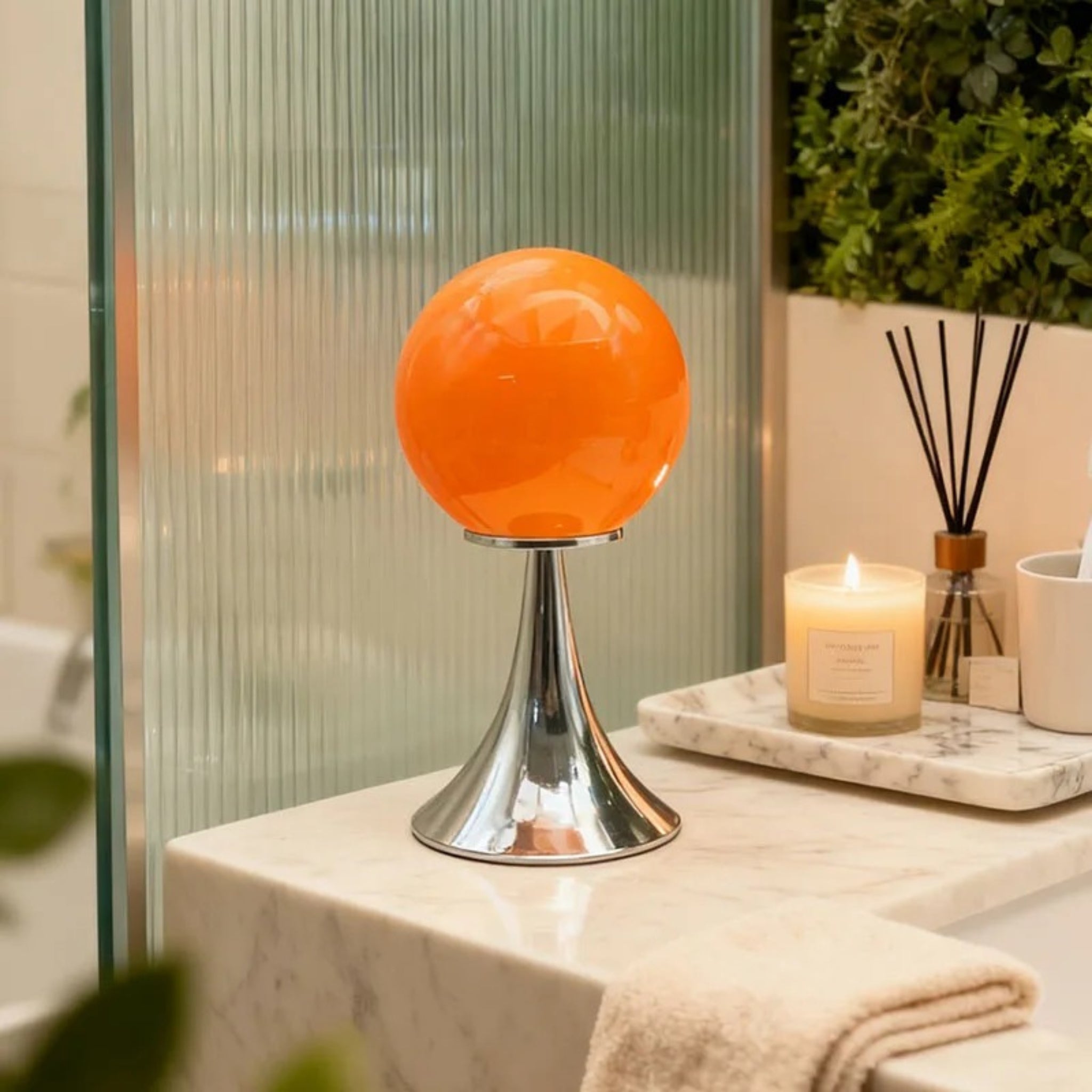 Elegant Glass Globe Lamp with Modern Metal Base