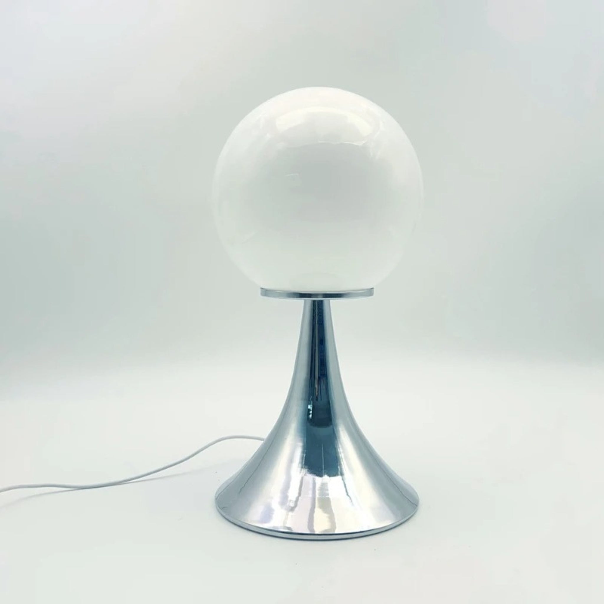 Elegant Glass Globe Lamp with Modern Metal Base