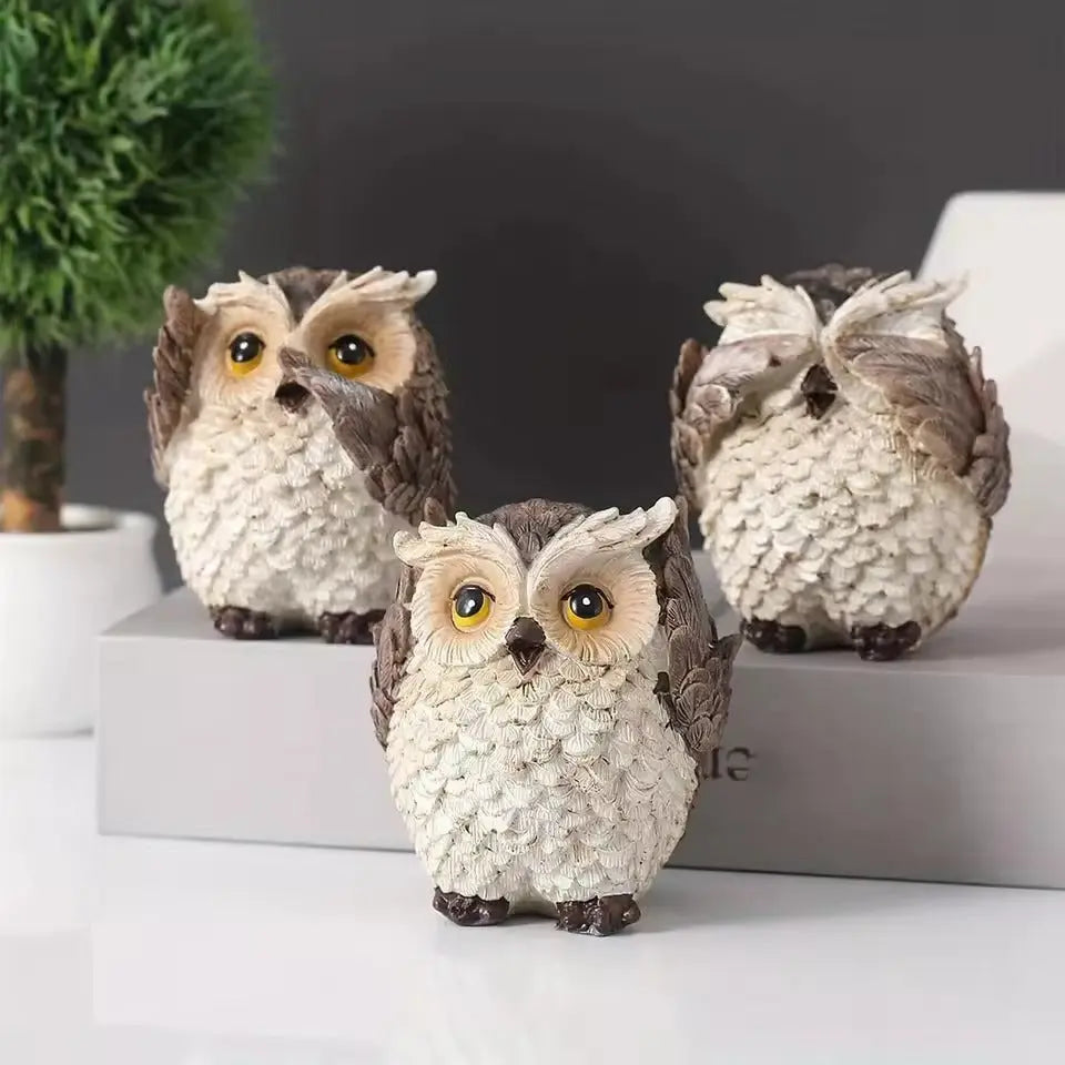 Charming Owl Trio with Unique Expressions