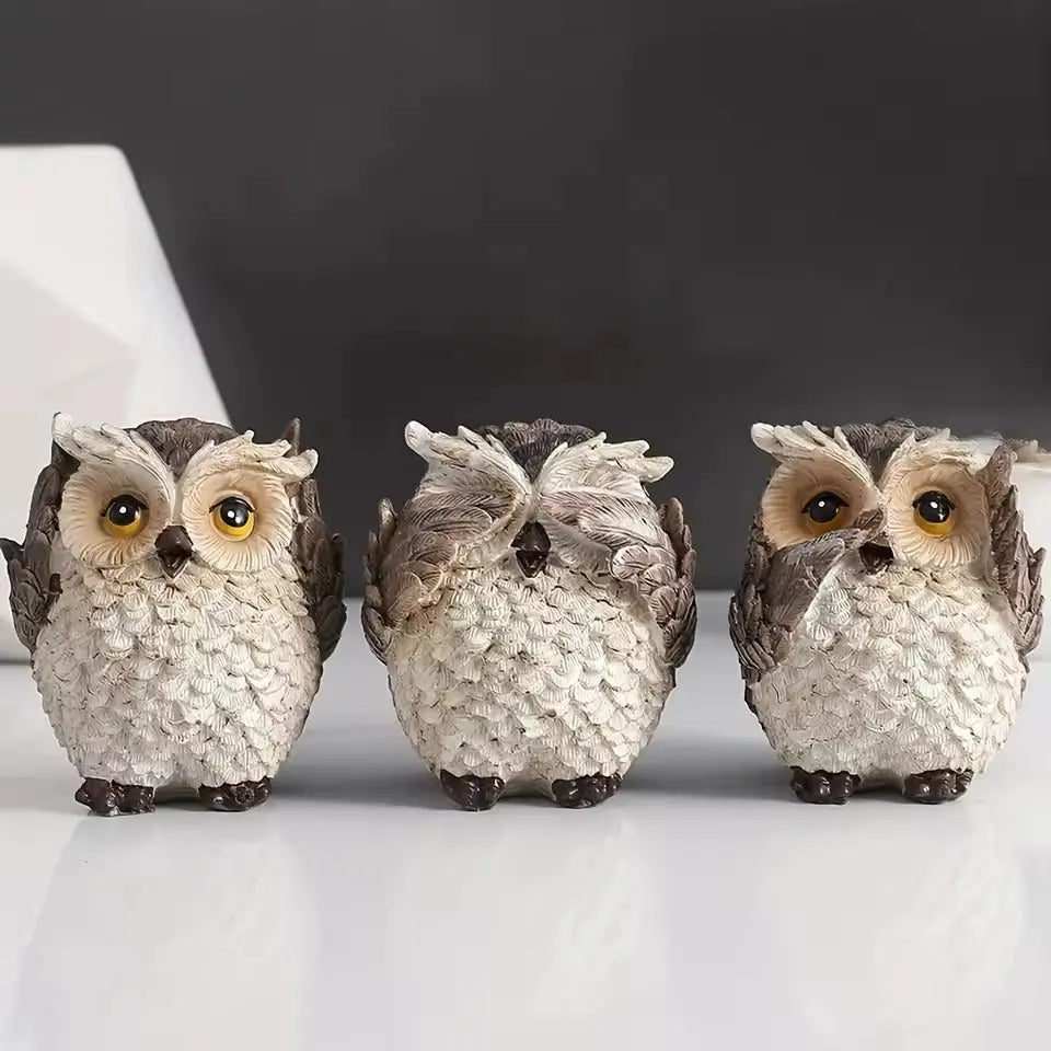Charming Owl Trio with Unique Expressions