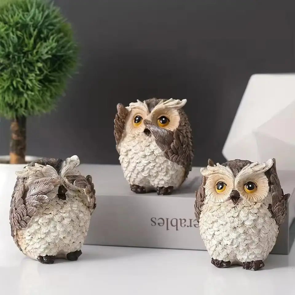 Charming Owl Trio with Unique Expressions